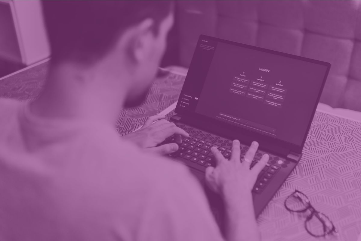 Outsourced IT support helping employees in office