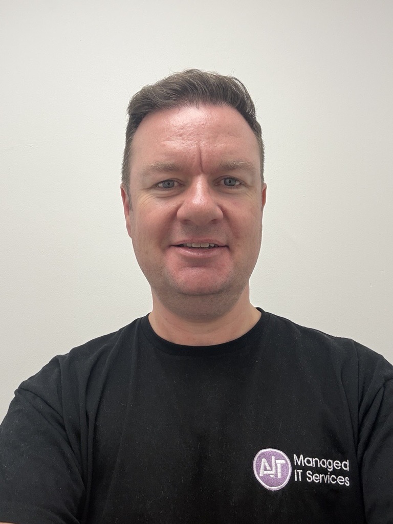 Russell Walker in AJT Managed IT Services t-shirt