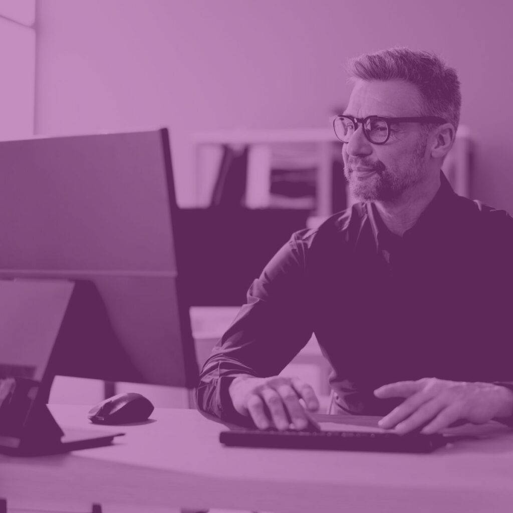 Man on computer at work