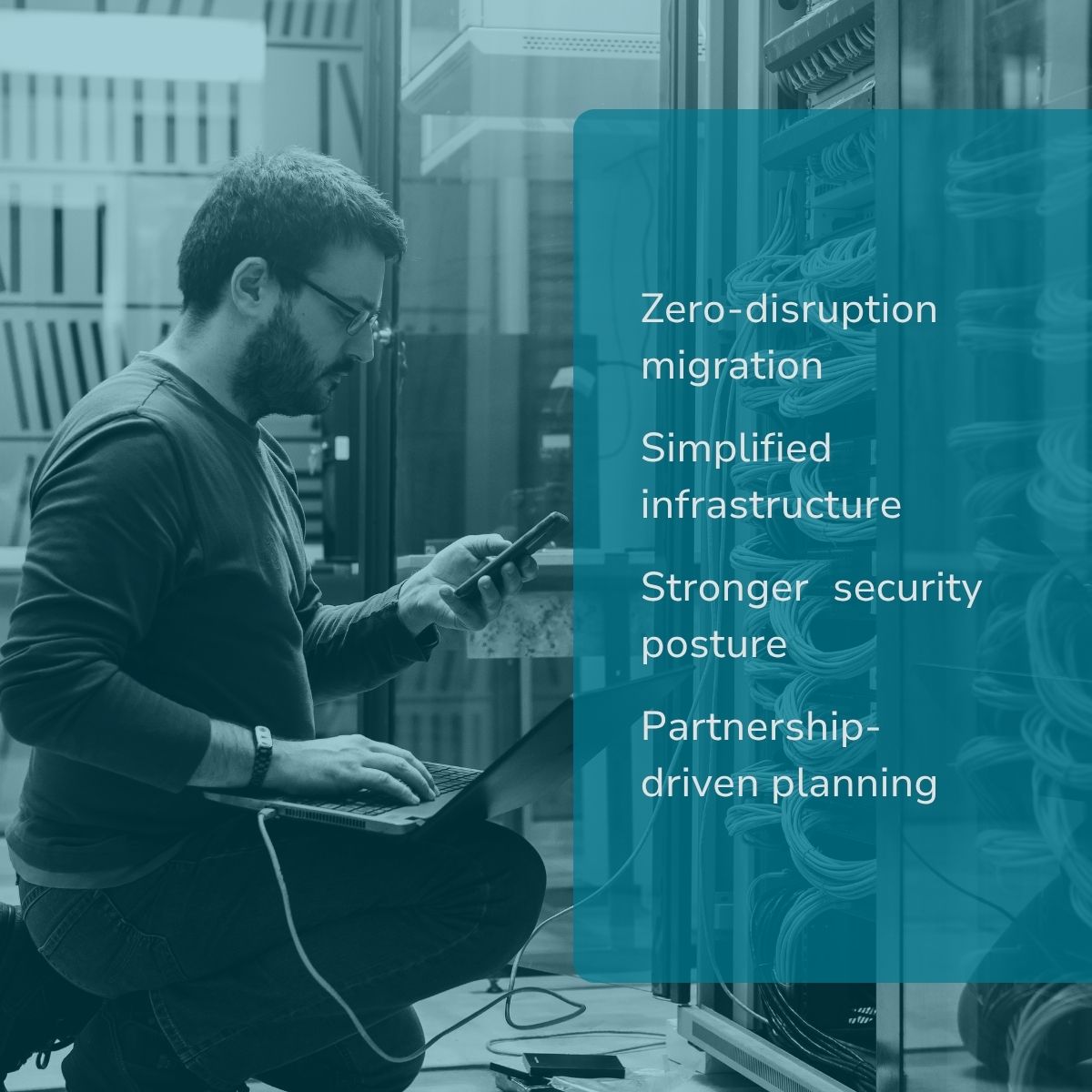 Man in server room working on cloud migration
